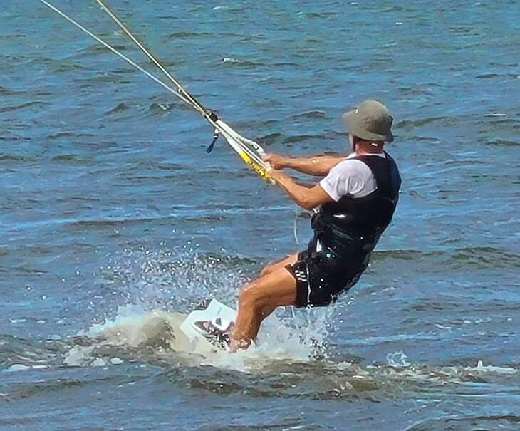 Author Michael Law kiteboarding in the Outer Banks