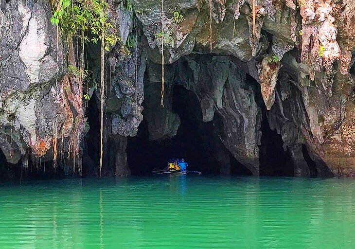 A boat entering the Underground River